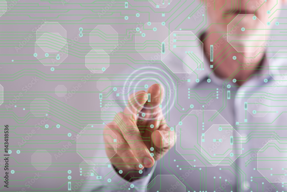 Man touching a digital technology concept on a touch screen Man touching a digital technology concept on a touch screen