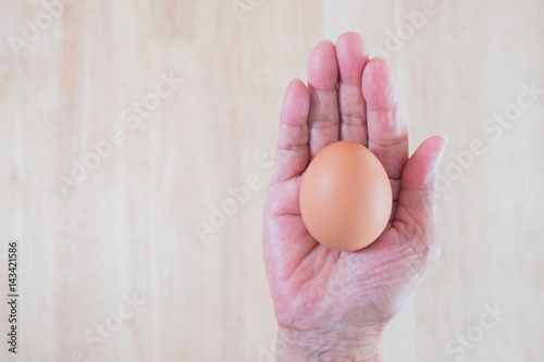 The chicken egg in the hand. Easter time, Happy time. Jesus rise again