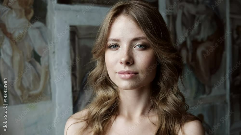 Portrait of beautiful caucasian blonde woman laughing. Beautiful woman smiling. Professional fashion model looking into the camera Portrait of beautiful caucasian blonde woman laughing. Beautiful woman smiling. Professional fashion model looking into the camera