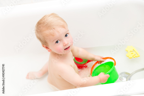 Adorable Small Boy Playing In The Bath