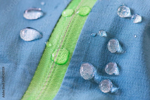 Obraz na płótnie Waterproof textile with zipper repels water w salonie