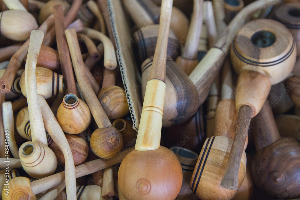 Lot of wooden pipes on the counter. Craft Lot of wooden pipes on the counter. Craft