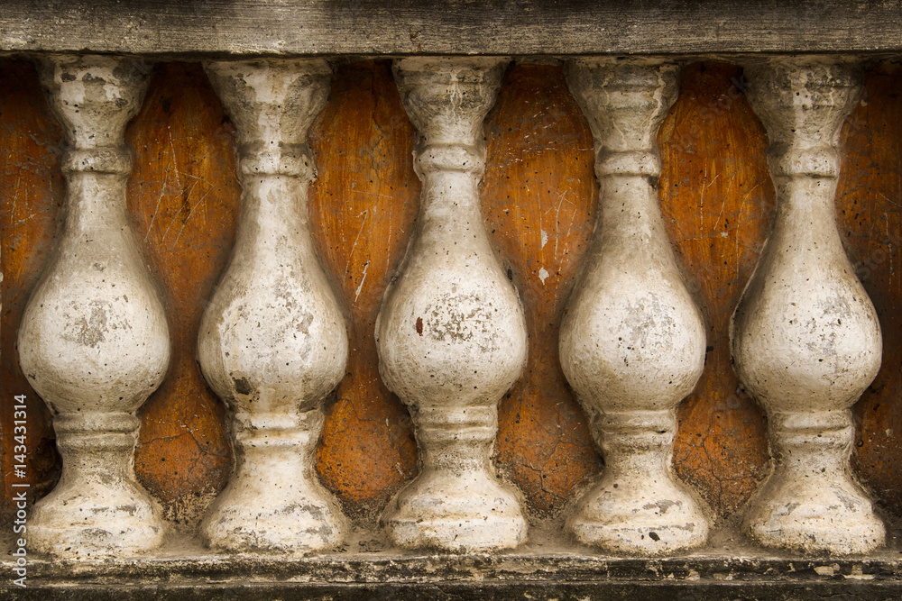 Fototapeta premium stone railings, on a orange background