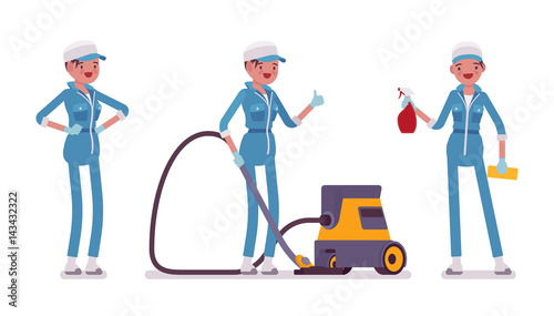 Female janitor standing with vacuum cleaner