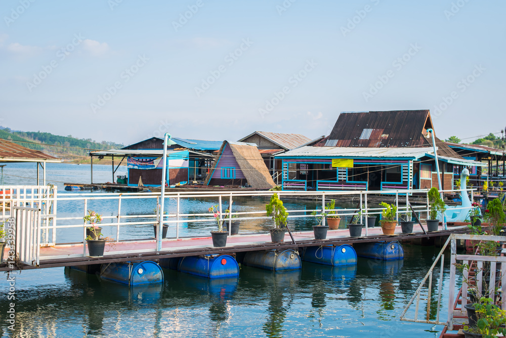 floating house near river in Kanchanaburi thailand