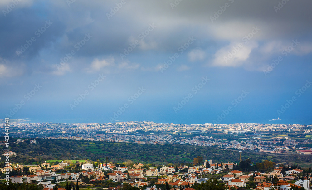 Panoramic view of city, forest, sky with clouds and sea. Paphos, Cyprus