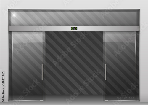 Double sliding glass doors with automatic motion sensor. Entrance to the office, train station, supermarket.