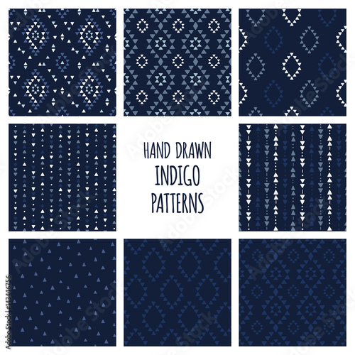 Set of hand drawn indigo blue patterns. Seamless vector navajo backgrounds with triangles, arrows, rhombuses and diamonds.