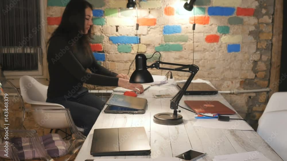 Young people start working in the office with laptops