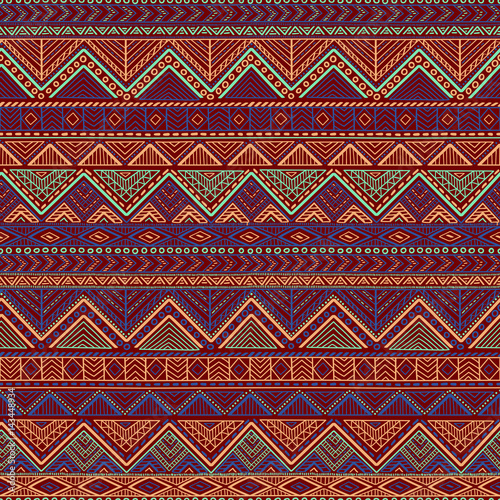 Seamless pattern in the bohemian style. Tribal and ethnic motives. Geometrical ornament. Print for your textiles.