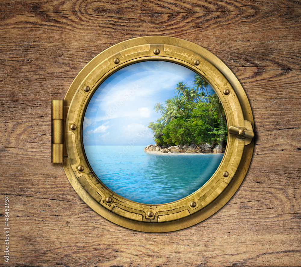 boat window or porthole with tropical island