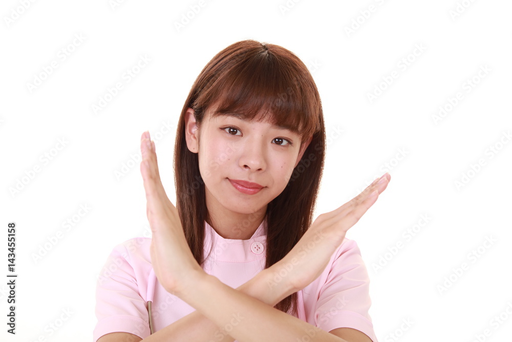 禁止の意思表示をする看護師
禁止の意思表示をする看護師