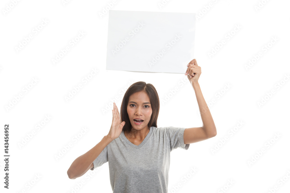 Young Asian woman surprise with white blank sign. Young Asian woman surprise with white blank sign.