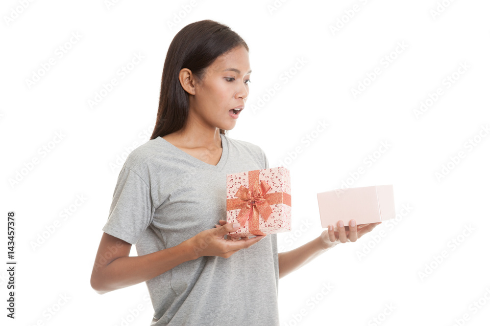Young Asian woman open a gift box. Young Asian woman open a gift box.