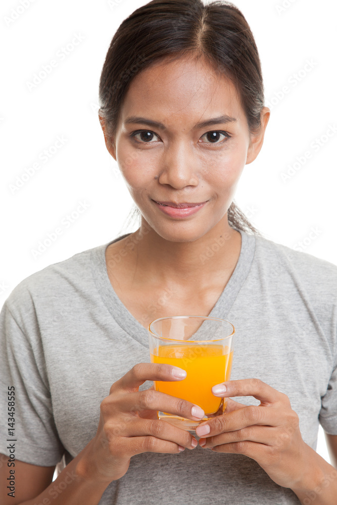 Young Asian woman drink orange juice. Young Asian woman drink orange juice.