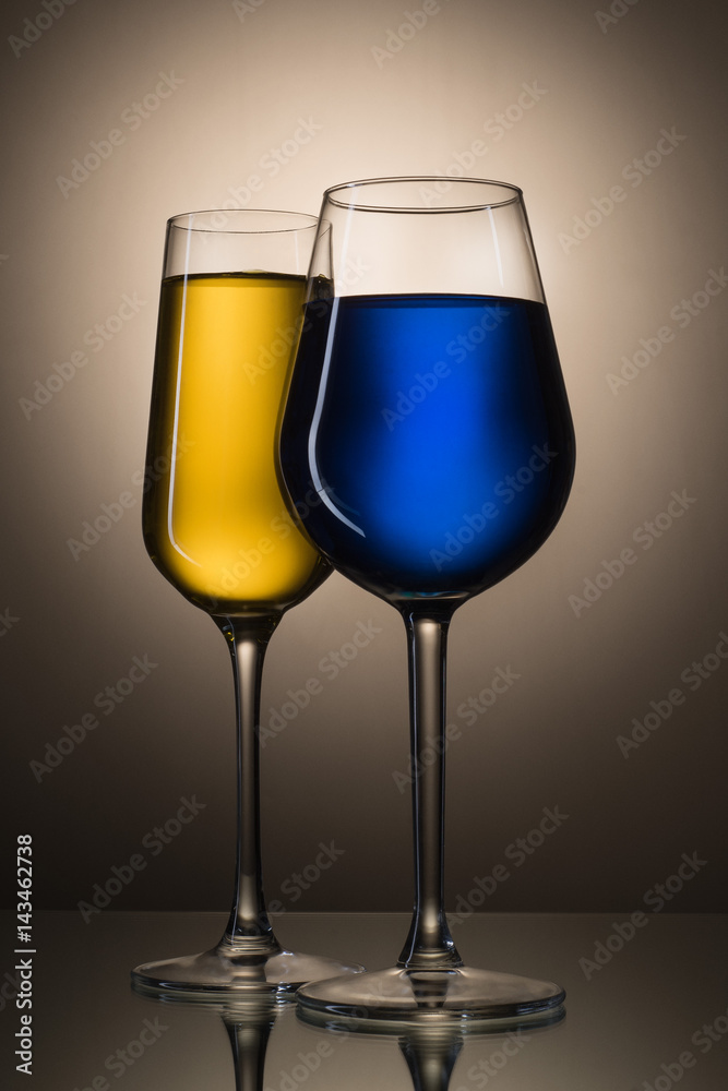 Still-life of glasses with the colored liquid