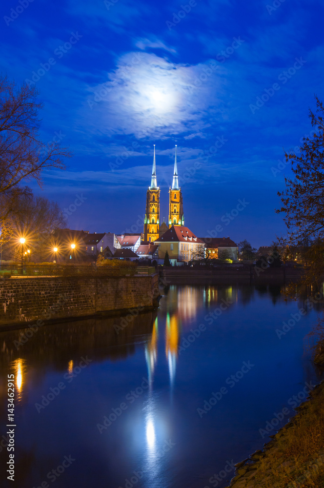 The Cathedral of St John Baptist by a full moon night Ostrow Tumski Wroclaw Breslau Poland