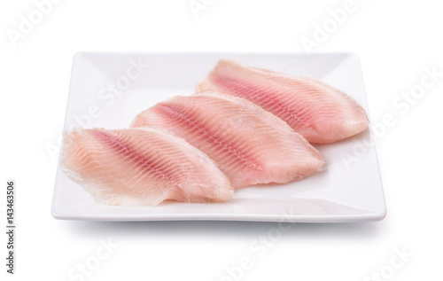 Fototapeta Plate with fresh raw fish fillet