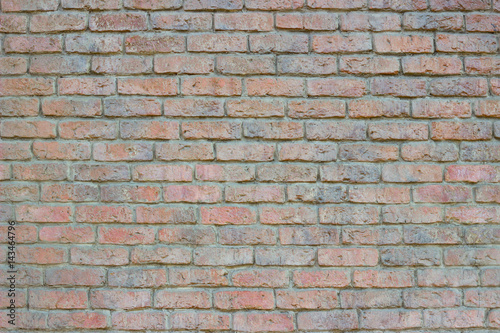 Old colored brick wall background