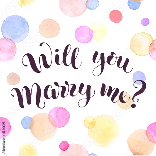 Will you marry me lettering with watercolor spots on background. Modern calligraphy. Romantic greeting card template.