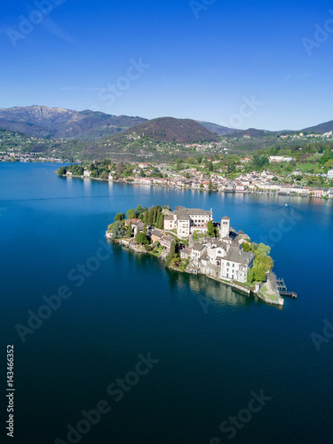 Aerial view of San Giulio Island and the village of Orta San Giulio. Orta Lake, Italy.