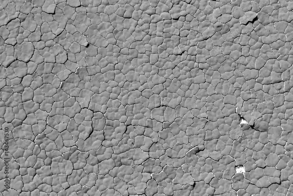 Gray color cracked plaster wall pattern. Gray color cracked plaster wall pattern.