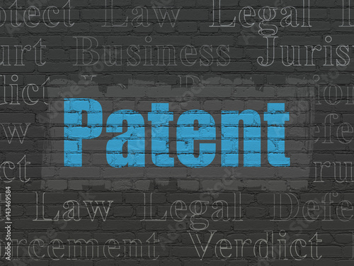 Law concept  Patent on wall background