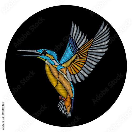 Fototapeta Embroidery flying Kingfisher on a black background
