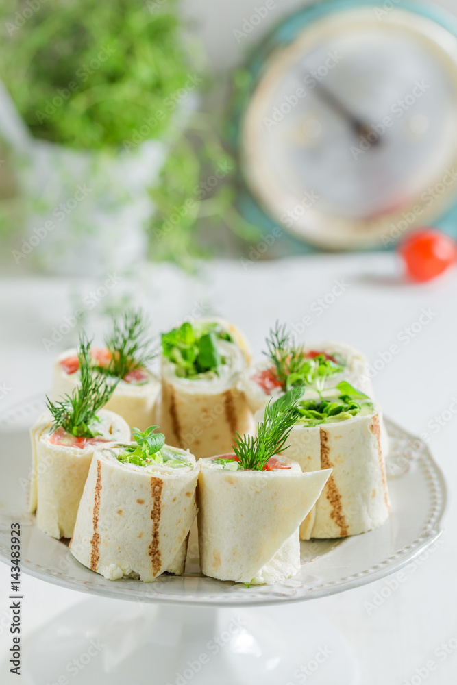 Delicious tortilla with salmon, cheese and vegetables for a brunch