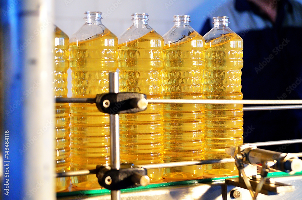 Sunflower oil. Factory line of production and filling of refined oil