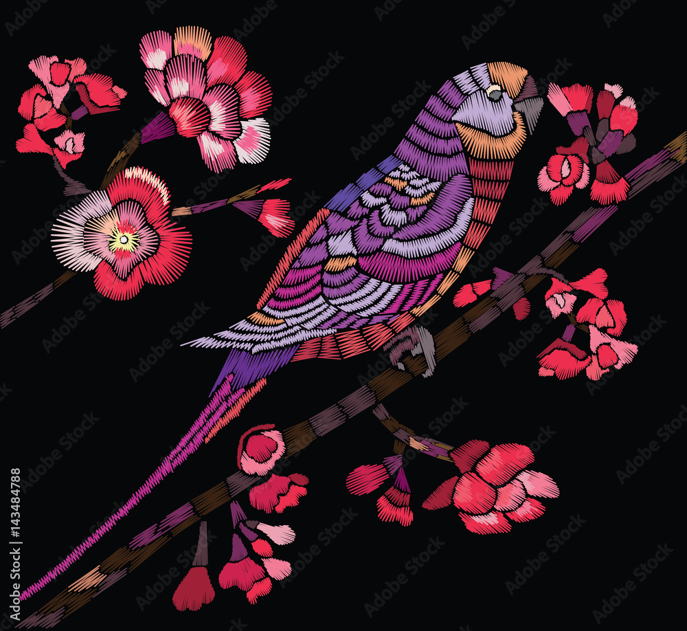 Obraz premium Flowering branch with a bird on a black background. Vector Illustration for embroidery, patches and stickers.