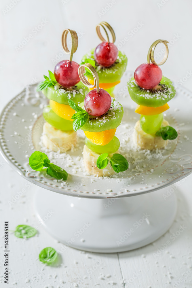 Homemade finger food with various fruits and mint for party Homemade finger food with various fruits and mint for party