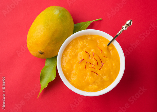 alphonso mango pulp or hapus aam ras or amba ras in marathi, selective focus