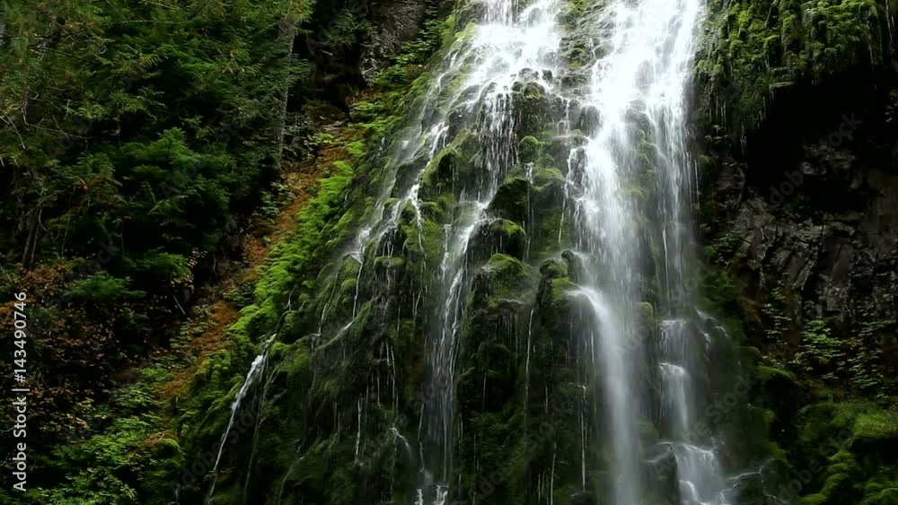 View of Waterfall with Green Mossy Rocks View of Waterfall with Green Mossy Rocks