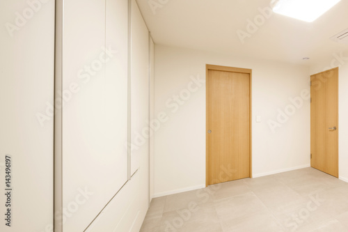 white empty room with wardrobe close for cleaning.
