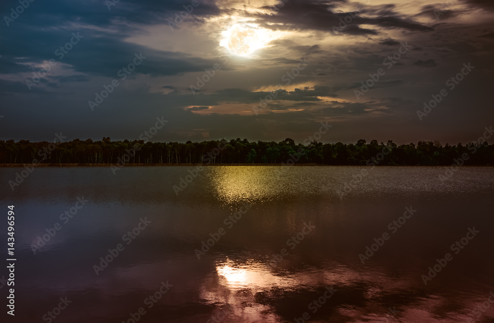 Fototapeta premium Full moon with reflection in sea. Beautiful nature background.
