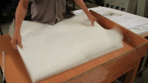 workers are working in printing workshop
