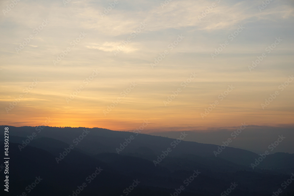 Bight and colorful high mountain landscape in haze.