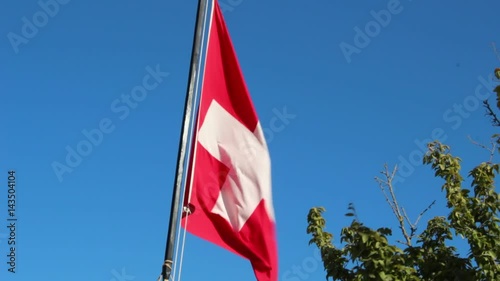 Aid Station, Field Hospital. Surgical Care To The Wounded In The War.  Red cross flag in the wind on mobile medical camp