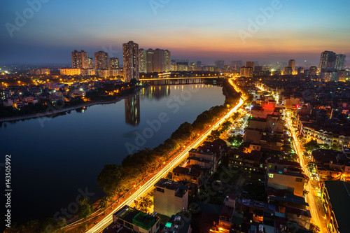 Aerial view of Hanoi skyline cityscape at twilight period. Linh Dam lake, south of Hanoi capital © Hanoi Photography
