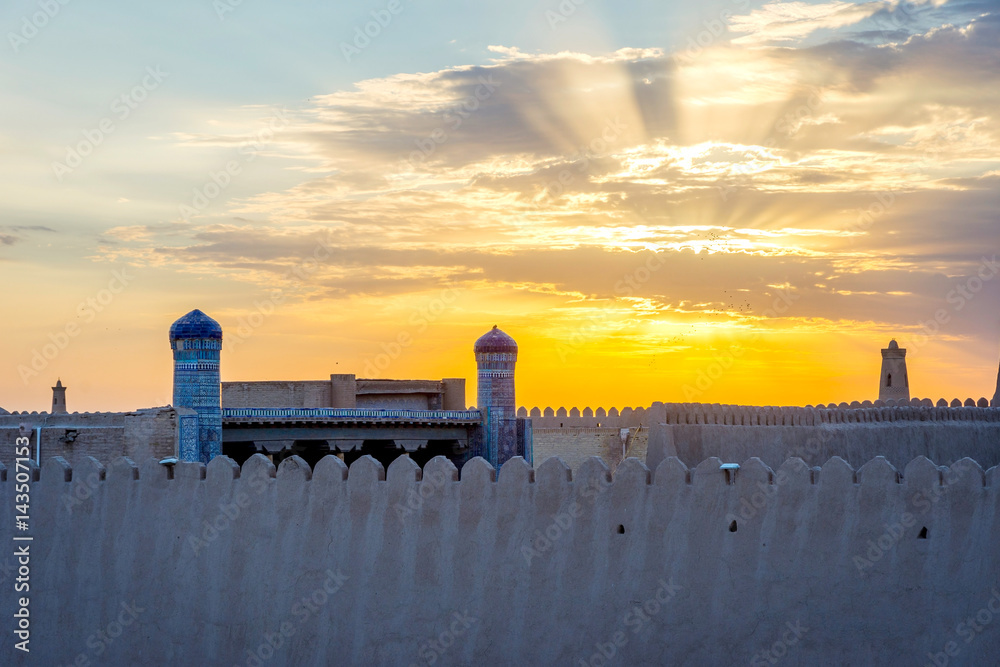 City wall of Khiva in sunset