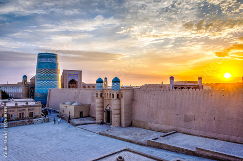 Old city wall and minaret, Khiva, Uzbekistan photo