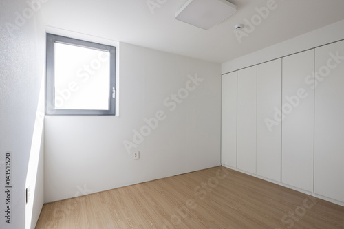 white empty room with window  wood floor