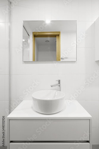 white toilet with bathtub