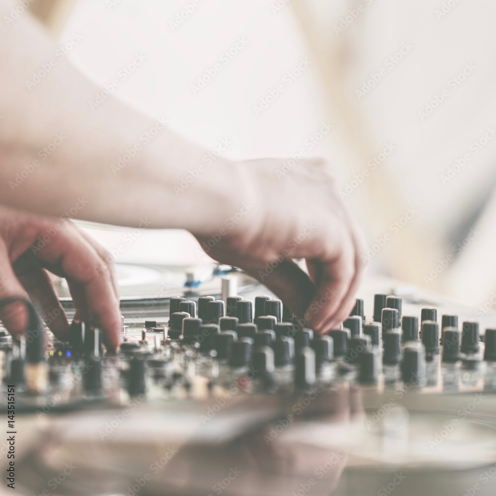 Summer dj party. Closeup hands and sound mixer Summer dj party. Closeup hands and sound mixer
