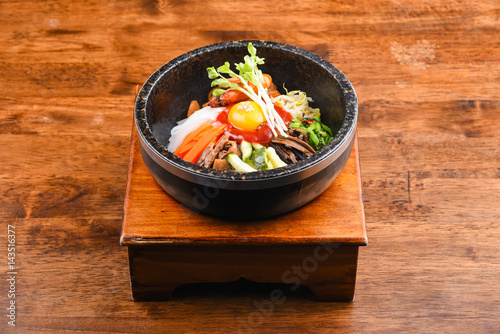 Bowl of bibimbap on the wooden table, Traditional korean food