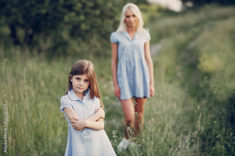 mom and daughter outside mom and daughter outside