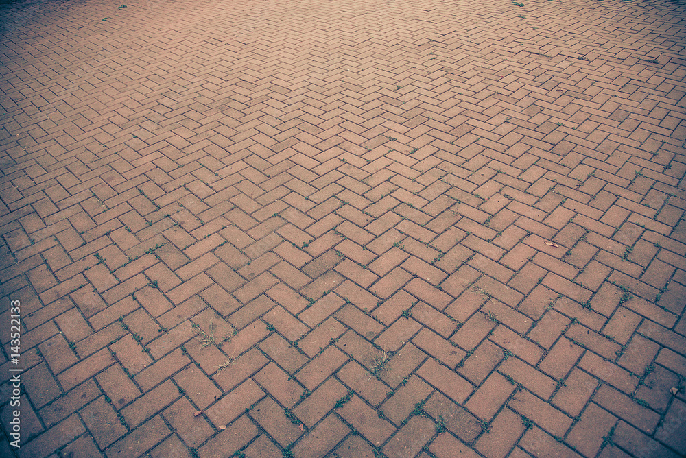 Fototapeta premium Old brick footpath background walk way. vintage tone