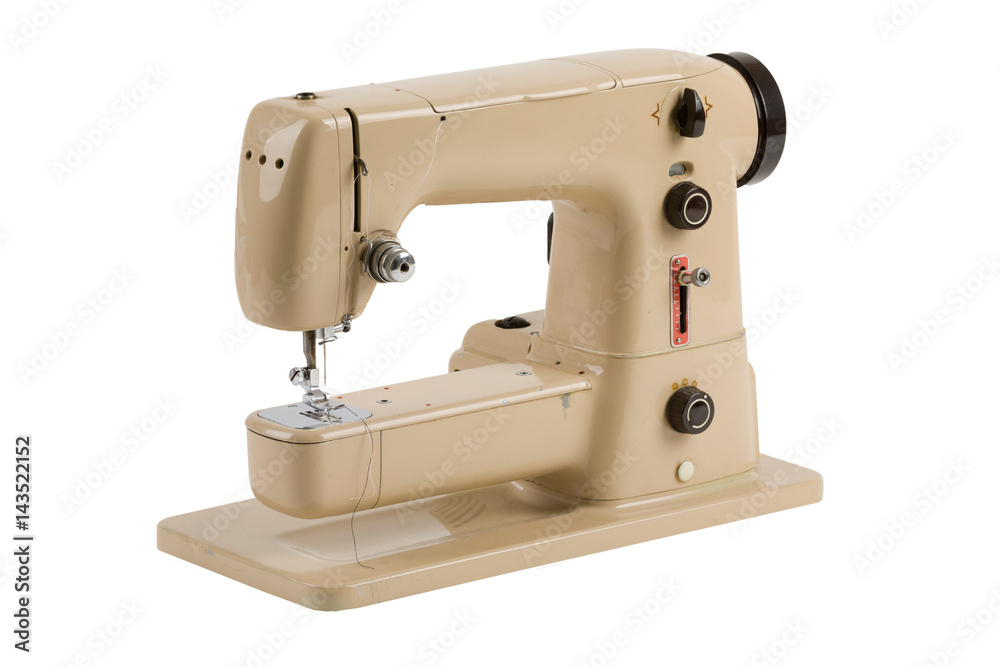 Old vintage sewing machine isolated