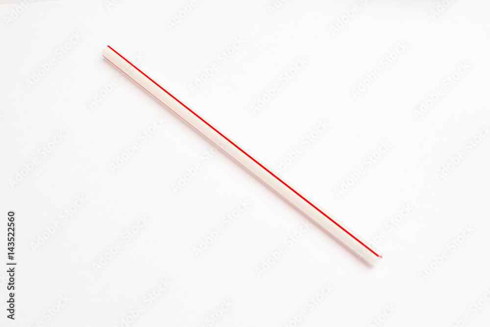 red straw for drinking on white background red straw for drinking on white background